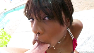 Sarah Banks gives a sloppy blowjob with intense deep throating