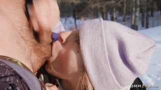 Angel Youngs is sucking two cocks outdoors