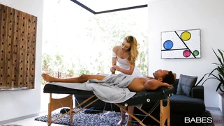 Alexa Grace is sucking black cock on massage table