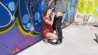 Mary Popiense is sucking Alberto Blanco's cock outdoors