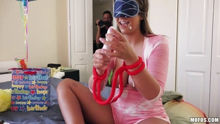 Blindfolded Layla London rubbing her pussy with the vibrator