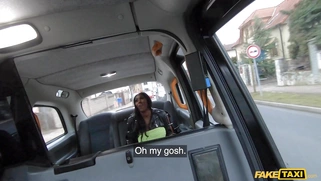 Ebony Mystique shows off her big tits and shaved pussy