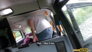 Nikki Riddle is sucking cock in the fake taxi
