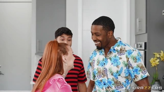 Madison Morgan is sucking two cocks in the kitchen