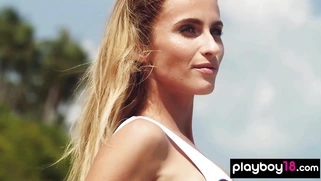 Skinny blondie stripping at the beach