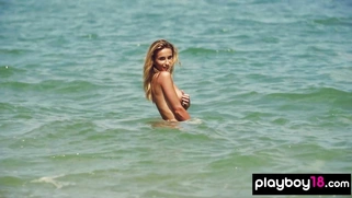 Skinny blondie stripping at the beach