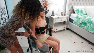 Tied Susie Stellar gets her pussy pleasured by Scarlit S.