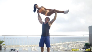 Apolonia Lapiedra and her private trainer are working out on the rooftop