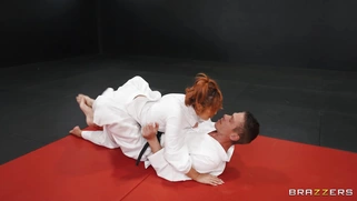 Mina Luxx is sucking Mick Blue's cock on the mat