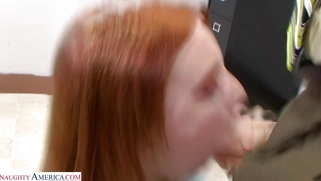 Redhead Megan Murray gives blowjob to Tom Byron