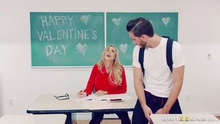 Brandi Love grades papers and rides her dildo at the same time