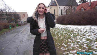 Blonde Micky Muffin is getting picked up outdoors