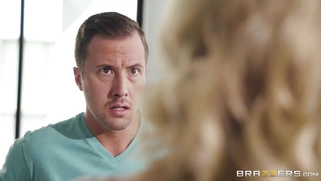 Mom Julia Ann allows her stepson to play with her big boobs