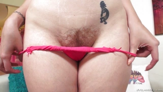 Redhead chick Lauren Phillips shows her nice big boobs