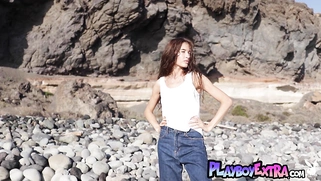 Russian babe relaxing naked at the beach