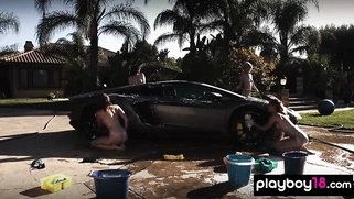 Petite blondie and nude GF washing a car