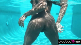 Naked ebony MILF fingers her hairy pussy