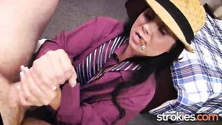Strokies Holly West smokes cigar and strokes dick