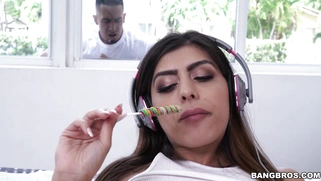 Horny teen Audrey Royal masturbating with a lollipop