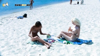 Beautiful blonde nudist sunbathe her trimmed pussy