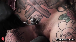 Busty tattooed slut tortured play