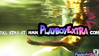 Teen reveals her pussy under the water