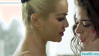 Curly haired brunette sits on lesbian trainers face