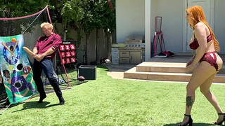 Big-booty redhead MILF plays ball with her stepson's huge white cock