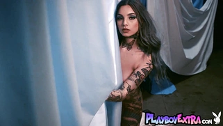 Taylor reveals her tattoo covered body