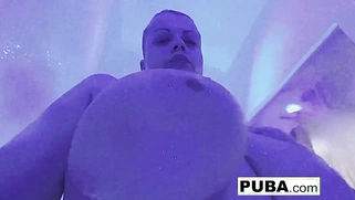A gorgeous wrestler engages in some double play.