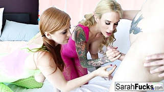 Penny and Sarah give a double BJ while dressed colorfully.