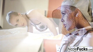 After a sex tease, hot Nicole gives herself a thorough massage.