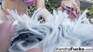 Penny Pax and attractive Kendra Cole frolic outside
