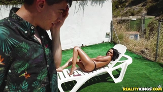 Busty Katrina Moreno sucking the big cock by the pool