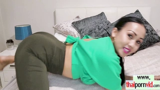 Thai MILF pleasuring an uncut white cock