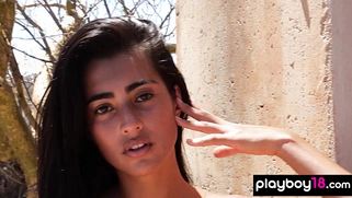 Latina teen poses nude under the hot sun
