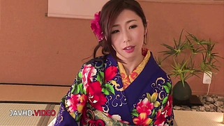 Sultry JAV Star in Kimono Gives Passionate Blowjob During Cam Show