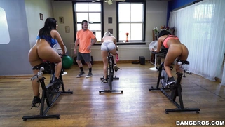 Rose Monroe shows her butt while riding the exercise bike