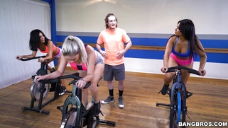 Rose Monroe shows her butt while riding the exercise bike