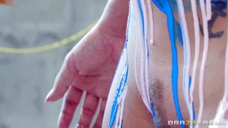 Blonde Bailey Brooke posing for the painter Kyle Mason