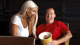 Bridgette B fingers her dripping wet pussy in the cinema