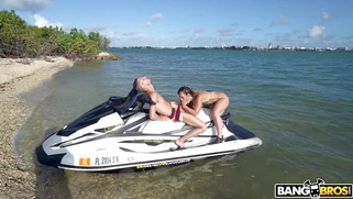 Kelsi Monroe sucking the big cock on the jet ski