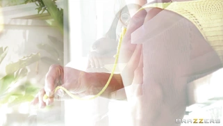 Ariella Ferrera sunbathing by the pool