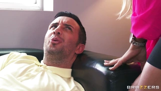 Spanish doll Briggette B demonstrates her large breasts