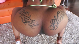 Sarah Banks demonstrates her wonderful tattooed ass