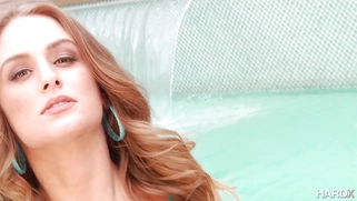 Daisy Stone demonstrates her big ass by the pool