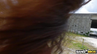 Kelsi Monroe does acrobatic tricks outdoors