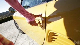 Big tit bitch Amy Anderssen posing near her sport car