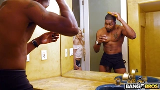 Elsa Jean is sucking the huge black shaft