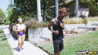 Assh Lee running on the street and demonstrating her big ass